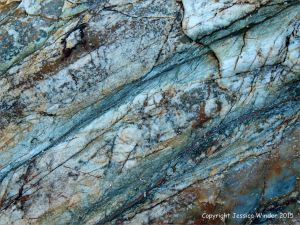 Colourful patterns in rip-rap rocks on Trinity Beach, Queensland