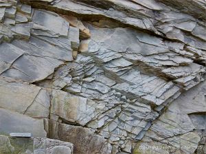 Close-up of the natural rock patterns in the cliffs at Cape Enrage