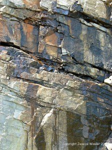 Close-up of the natural rock patterns in the cliffs at Cape Enrage