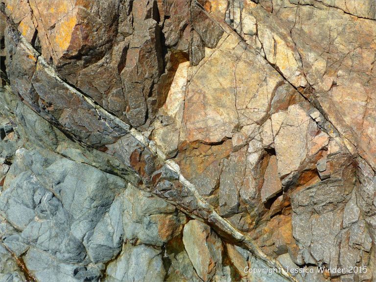 Contrasting rock textures at Moulin Huet Bay
