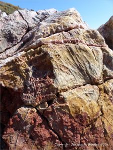 Rock texture and pattern in red haematite in Carboniferous limestone at Worm's Head