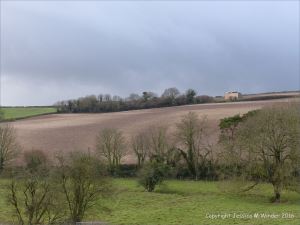 English countryside view with bare ploughed field