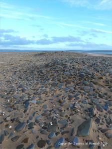 Pebble spit with sand at Whiteford