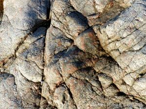 L'Eree Granite on the beach in Guernsey
