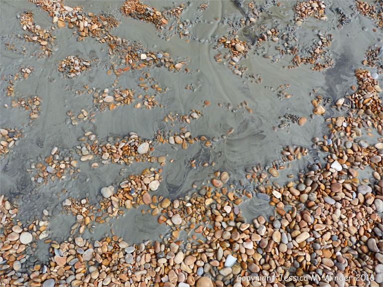 Patterns in liquid mud on the seashore