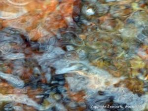 Water texture, colour and pattern in a fast flowing mountain stream
