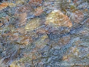 Water texture, colour and pattern in a fast flowing mountain stream