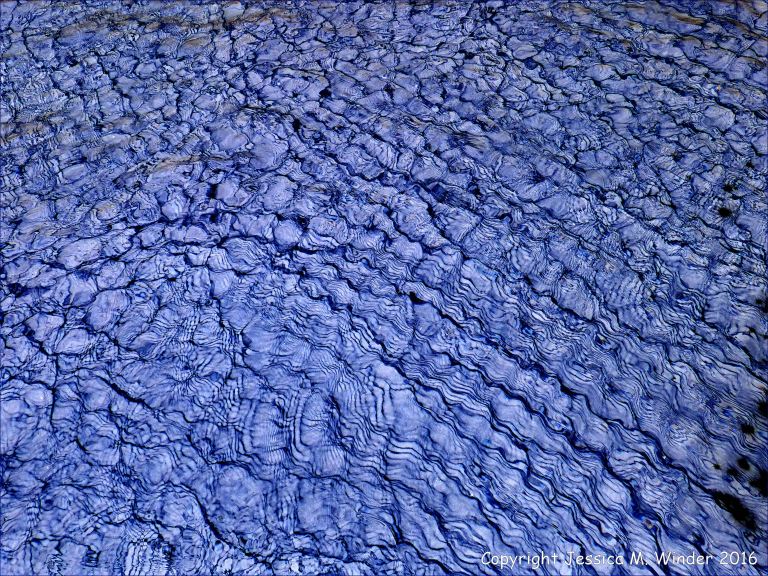 Patterns of reflected light on wate