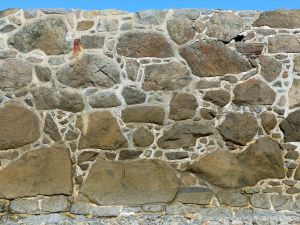 Local stone in the sea wall in the southern part of Rocquaine Bay