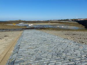 Cobbles of local stone in the slipway at Rocquaine Bay