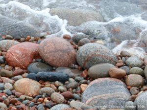 Pebbles at the water's edge in Pleasant Bay, cape Breton, NS.
