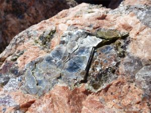 Close-up of texture and pattern in Devonian plutonic rocks used as rip-rap at White Point Harbour in Cape Breton Island, Nova Scotia, Canada.