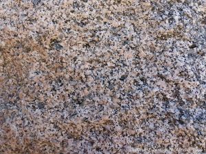 Close-up of texture and pattern in Devonian plutonic rocks used as rip-rap at White Point Harbour in Cape Breton Island, Nova Scotia, Canada.