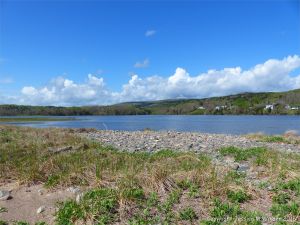 View looking southwest across Ogden's Pond from Crystal Cliffs Beach