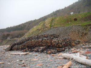 Sea defence gabions filled with beach stones at Corney Brook, Cape Breton Island