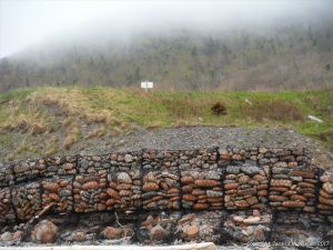 Sea defence gabions filled with beach stones at Corney Brook, Cape Breton Island