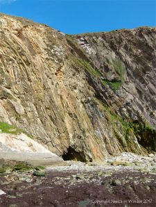 Cliffs with caves at Dunquin Harbour