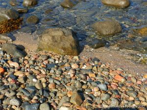 Wet rocks and pebbles at Rousse Point