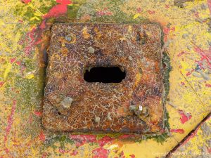 Detail of a wrecked mooring buoy on the sand at Rhossili