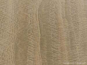 Patterns in the sand near Spaniard Rocks on Rhossili Beach in Gower