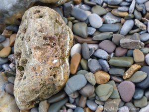 Rocks and pebbles near Twlc Point at Broughton Bay on the Gower Peninsula in South Wales