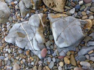 Rocks and pebbles near Twlc Point at Broughton Bay on the Gower Peninsula in South Wales