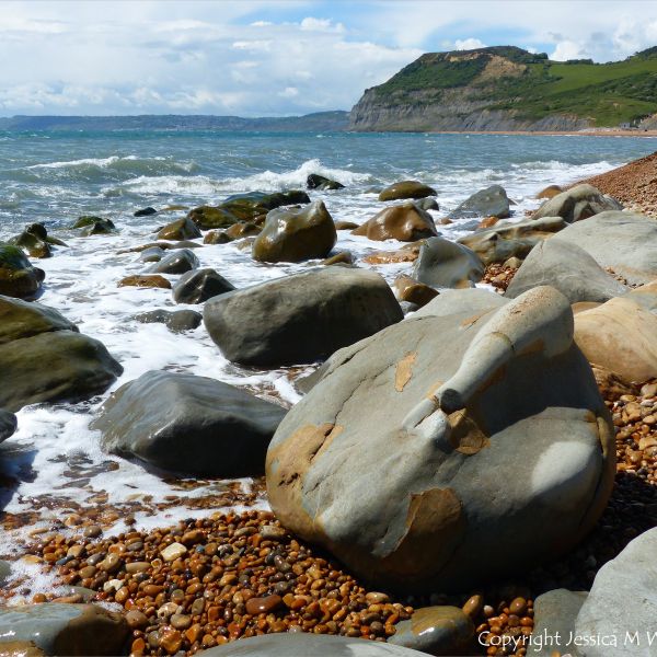 Boulders on the water's edge at Seatown in Dorset