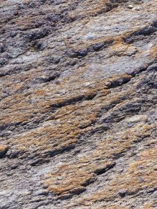 Rocks composed of volcanic ash (tuff) near Louisbourg Lighthouse in cape Breton, Nova Scotia.