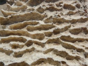 Ridge and furrow texture and pattern on the eroded surface of gypsum building blocks