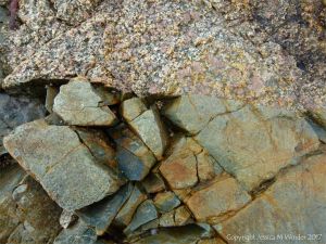 Juxtaposition of granite and intrusive dike material