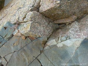 Coarse granite and smooth dike rocks