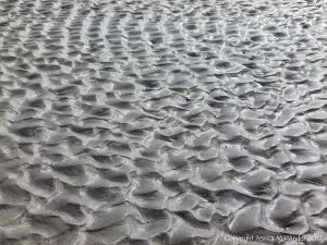 Close-up of sand ripple pattern on the beach at Ventry Bay on the Dingle Peninsula in Ireland