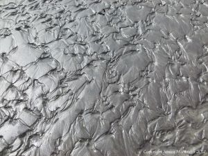 Close-up of sand ripple pattern on the beach at Ventry Bay on the Dingle Peninsula in Ireland