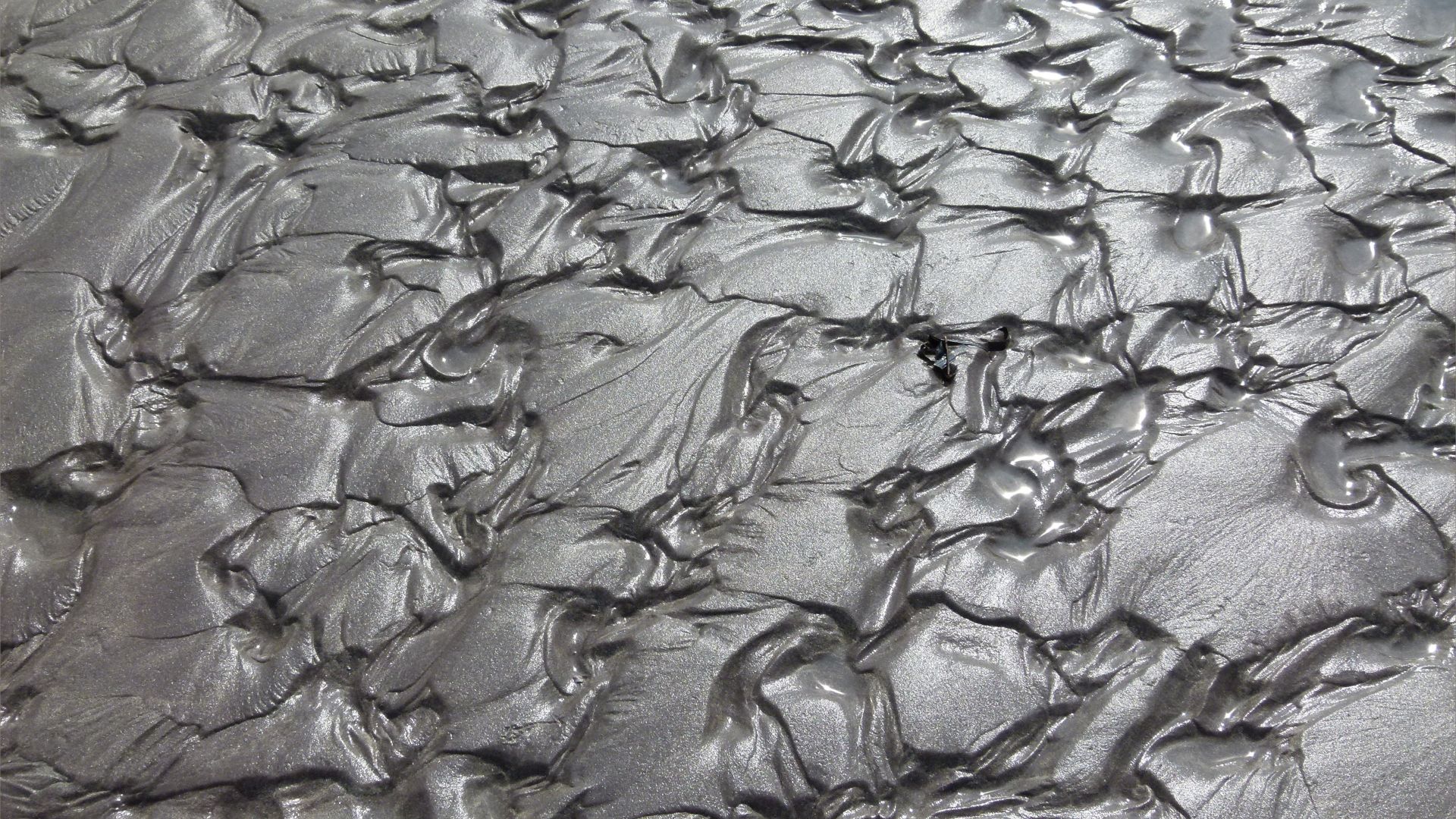 Close-up of sand ripple pattern on the beach at Ventry Bay on the Dingle Peninsula in Ireland