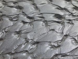 Close-up of sand ripple pattern on the beach at Ventry Bay on the Dingle Peninsula in Ireland