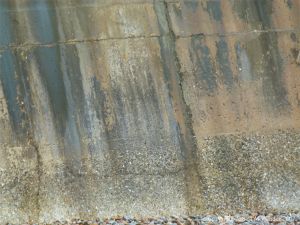 Natural pattern of staining on an old concrete sea wall