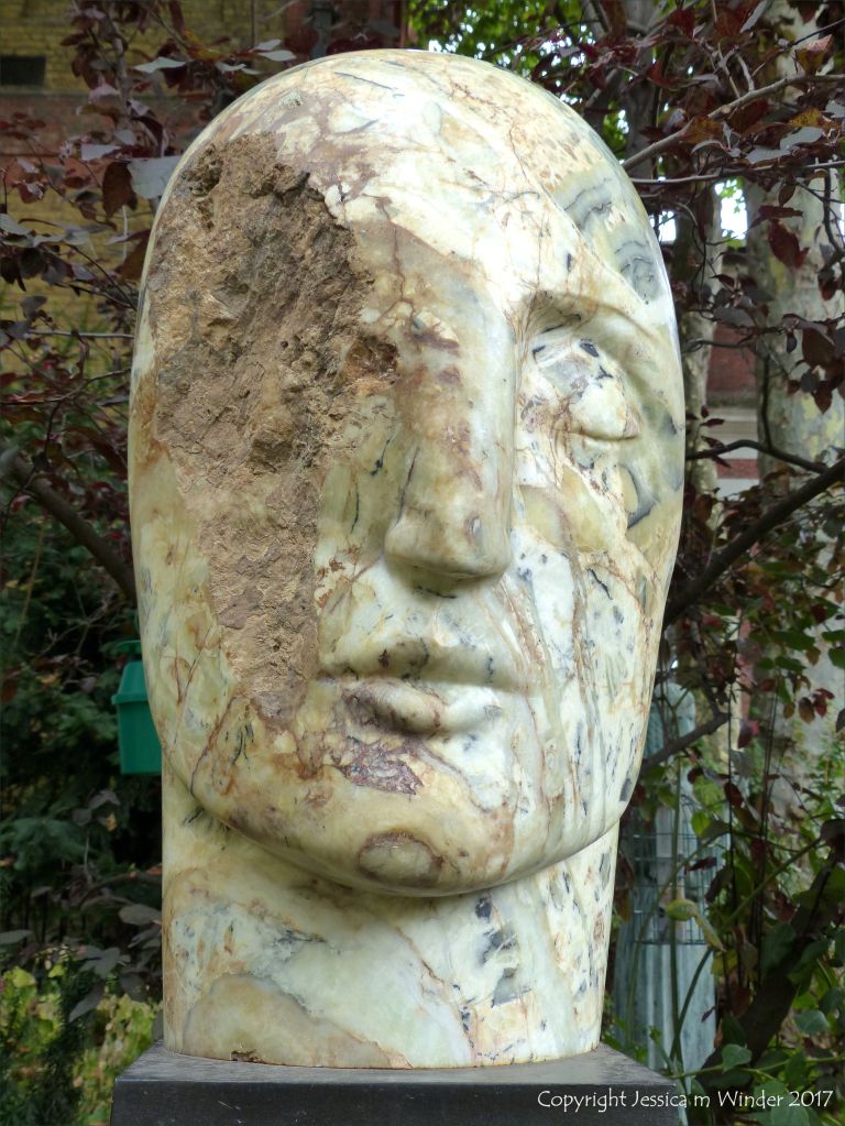 Sculpted head "Veltha" by Emily Young