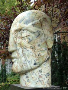 Sculpted head "Veltha" by Emily Young