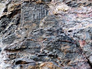 Wet rock-face texture and pattern in slate