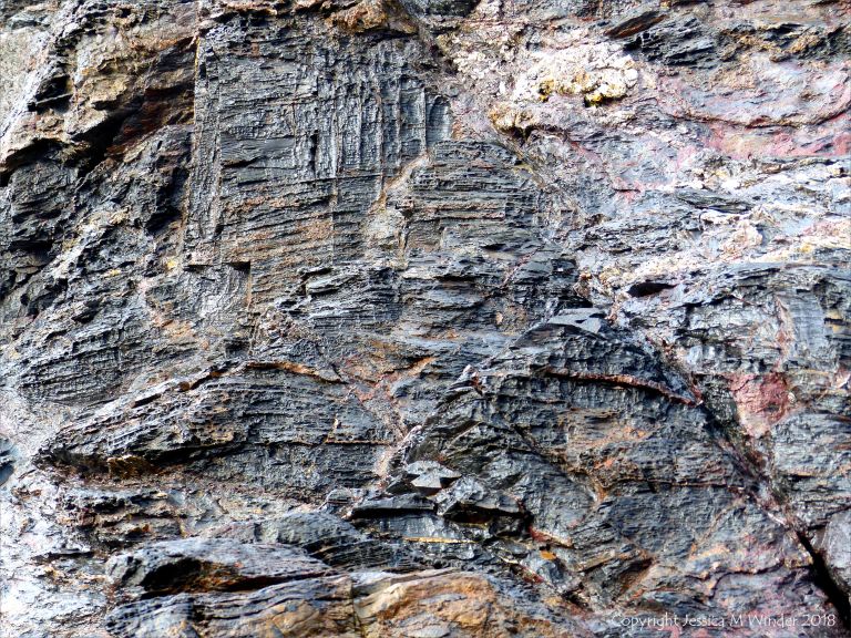 Wet rock-face texture and pattern in slate