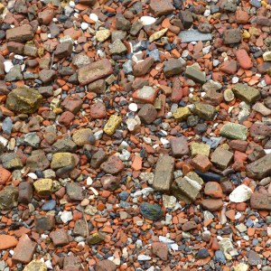 Detail of building and domestic debris on an urban beach along the River Thames in London