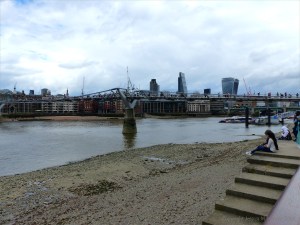 View of the Thames foreshore at low tide from the South Bank in London
