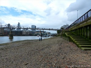 View of the Thames foreshore at low tide from the South Bank in London