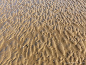 Natural patterns in the sand on the beach