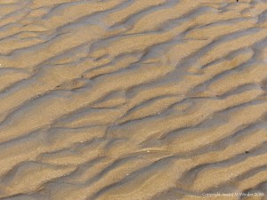 Natural patterns in the sand on the beach