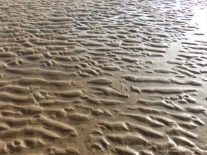 Natural patterns in the sand on the beach