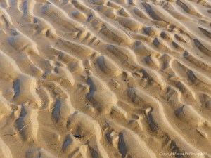 Natural patterns in the sand on the beach