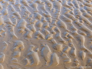 Natural patterns in the sand on the beach
