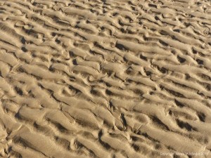 Natural patterns in the sand on the beach