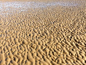 Natural patterns in the sand on the beach